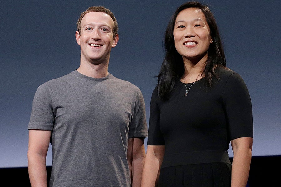 Mark Zuckerberg and Priscilla Chan smiling