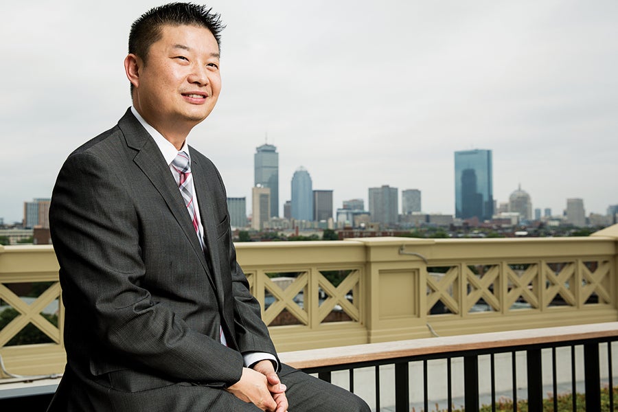 Tommy Chang in front of the skyline