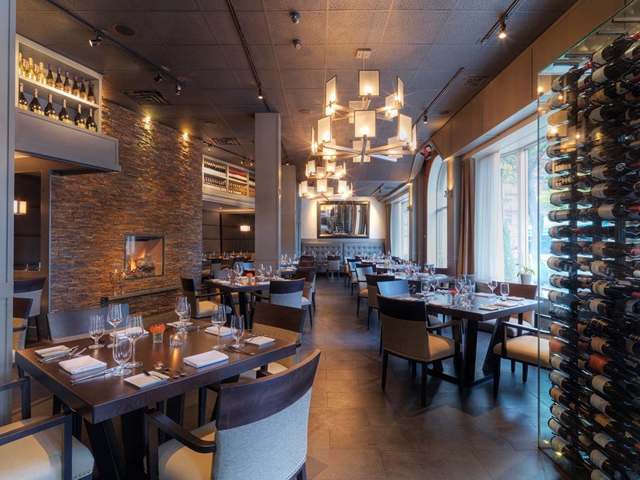 Deuxave dining room with fireplace