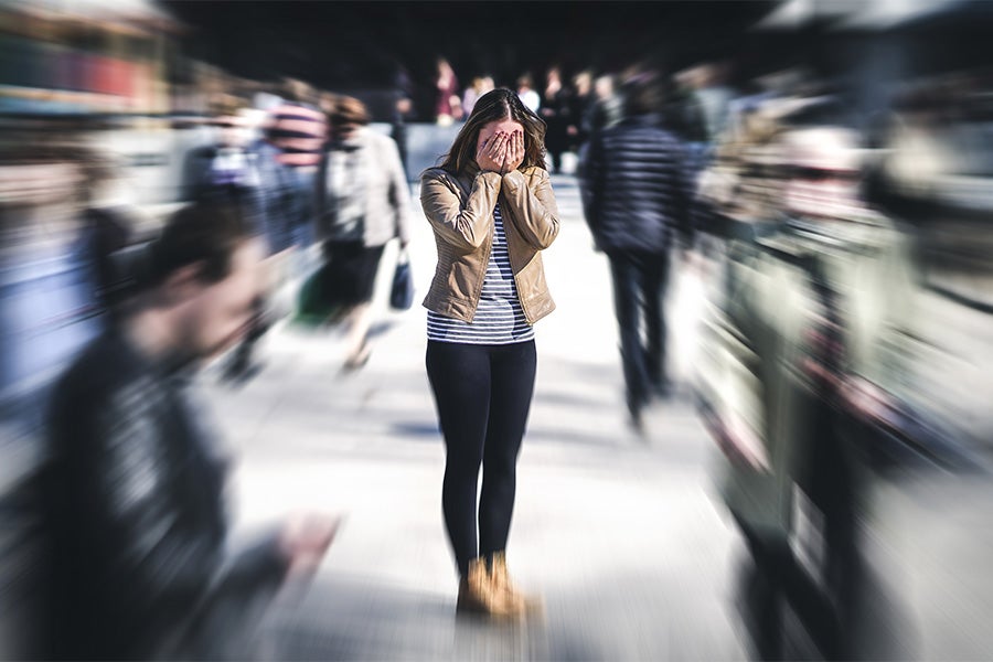 stressed woman on city street