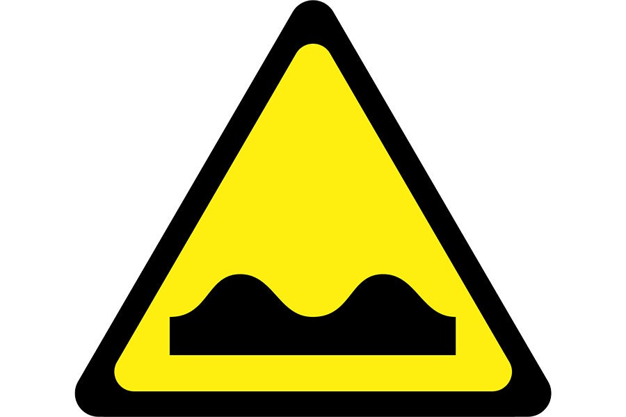 road sign with bumps