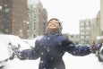 child enjoying snow
