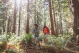 family walking in woods