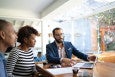 couple talking to financial adviser