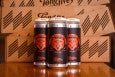 Three beer cans feature red cat-themed art on a black label.