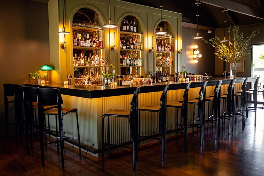 An empty, elegant restaurant bar area.