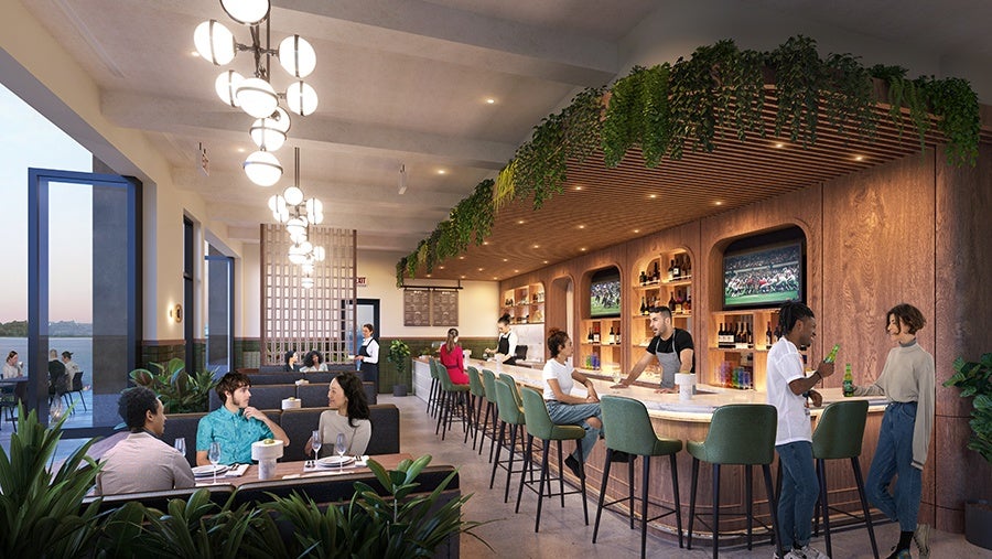 Rendering of a bar and restaurant with large windows open to waterfront dining space and lots of greenery and light wood inside.
