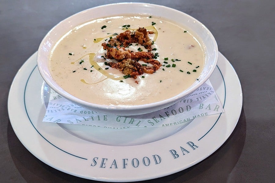 Chowder topped with fried bits of seafood.