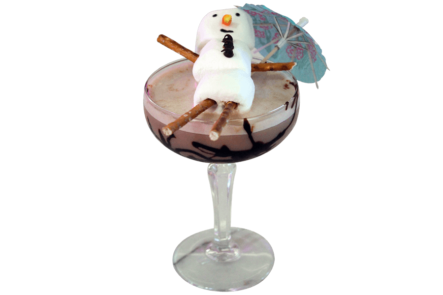 A marshmallow snowman lounges under a cocktail umbrella on top of a chocolate cocktail.