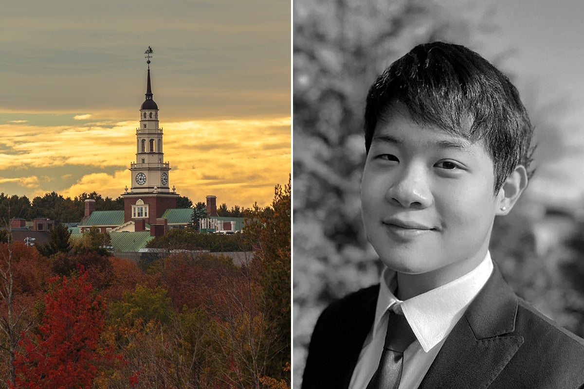 A tall clock tower with a spire rises above a building surrounded by trees with autumn foliage under a cloudy sky at sunset. Next to it, a black-and-white portrait of a young man wearing a suit and tie, smiling slightly with a blurred natural background.