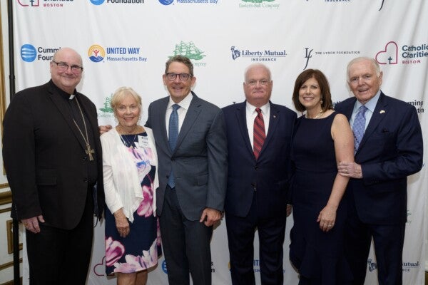 Archbishop of Boston Richard G. Henning, Kathy Flynn, Liberty Mutual's Tim Sweeney, CCAB Board Chair Mark Kerwin, CCAB President & CEO Kelley Tuthill and former Boston Mayor Ray Flynn